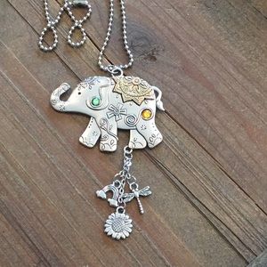 Elephant charm necklace.